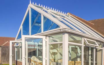 conservatory roof insulation costs Synod Inn